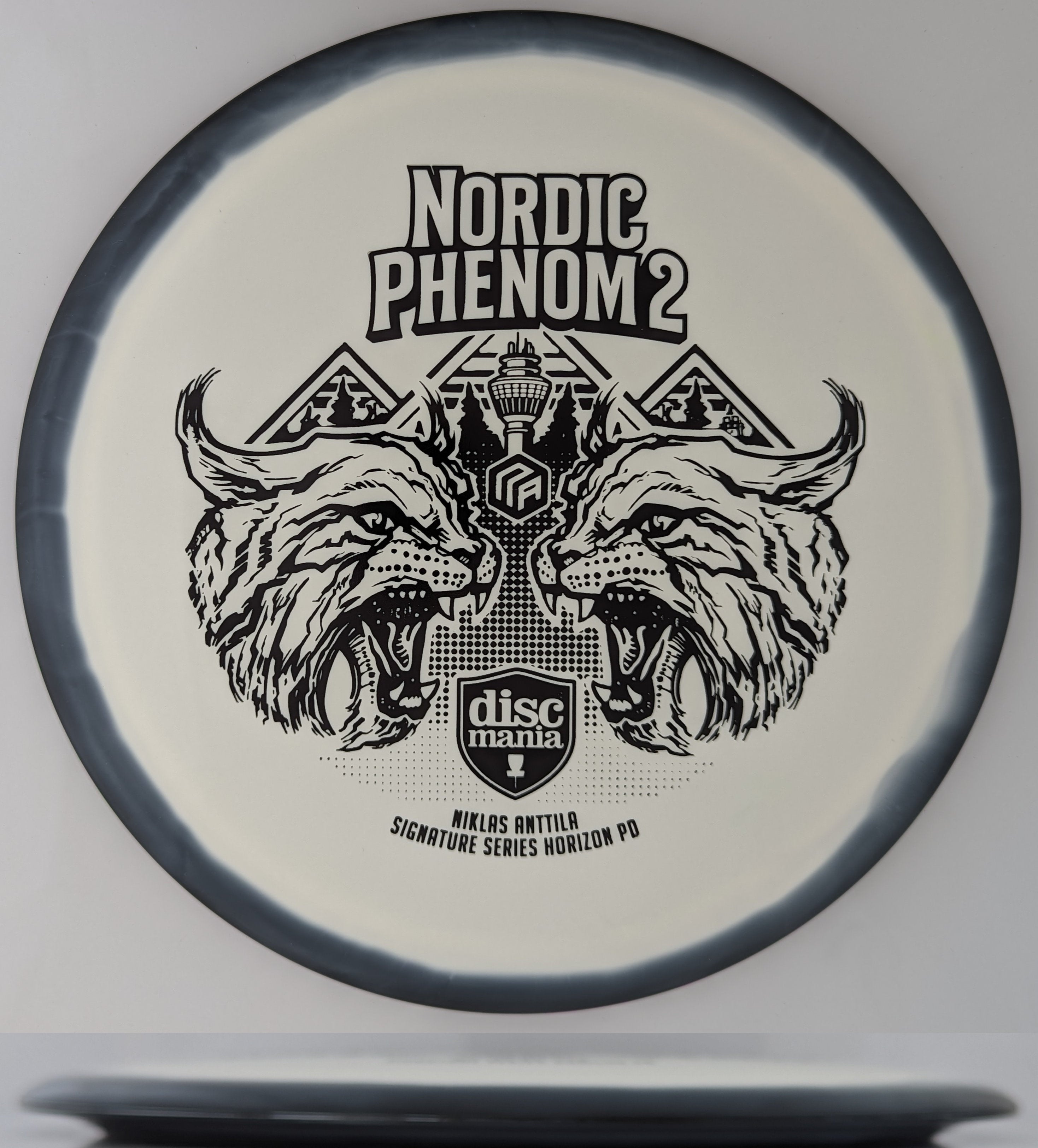 White Discmania PD Power Driver disc with black rim, made with Horizon S-Line plastic blend, with black Niklas Anttila Nordic Phenom 2 stamp